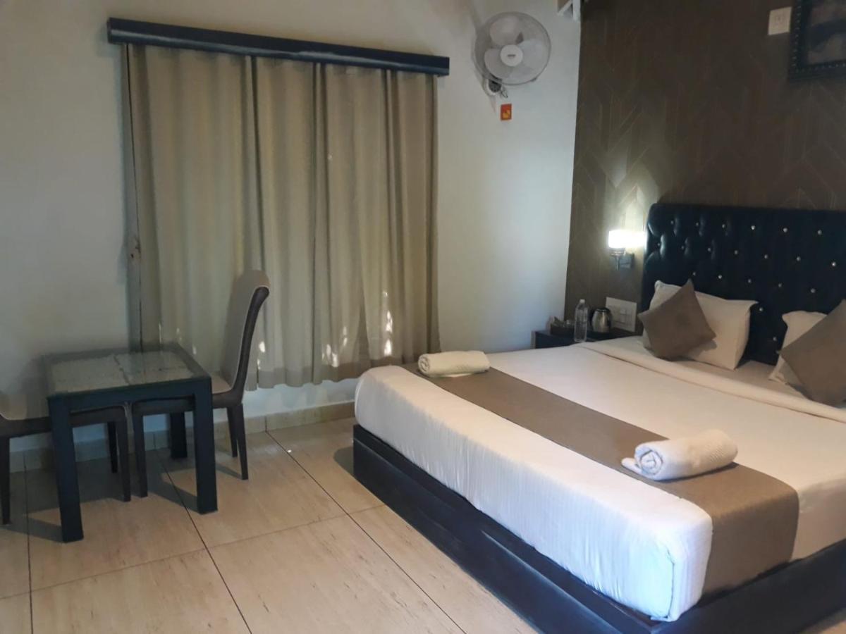 Misty Rain Estate Hotel Madikeri Buitenkant foto